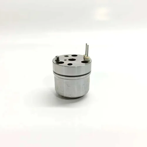 1K060372-64-7206-0372-John-Deere-RE533501-E1-EUI-Control-Valve-Main-Image 1K060372-64 7206-0372 electronic unit injector control valve suitable for John Deere E1 system applications. Upright side profile showing the full cylindrical metal housing with twin connection pins protruding from the polished top cap surface.