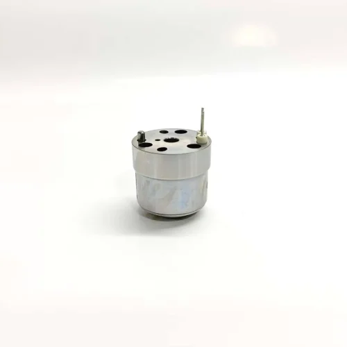 1K060379-64-7206-0379-Volvo-Truck-20430583-E1-EUI-Control-Valve-Main-Image 1K060379-64 7206-0379 electronic unit injector control valve suitable for Volvo Truck E1 system applications. Upright side profile showing the full cylindrical metal housing with twin connection pins protruding from the polished top cap surface.