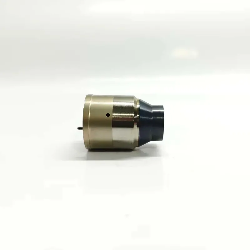 2-7135-754-EUI-Solenoid-Control-Valve-Side-Profile Clean side profile view of the 7135-754 solenoid control valve showing the multi-tier cylindrical metal body design for heavy-duty pump nozzle systems.