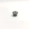 Direct top-down view of 7206-0460 1K060460-64 electronic unit injector control valve assembly showing the flat polished surface plate layout, concentric circle patterns, and vertical precision guide pins.