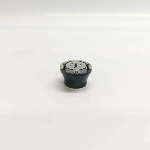 2-7206-1010-1K061010-64-F2P-BEBJ1D04001-EUI-Control-Valve-Main-Image Direct top-down view of 7206-1010 1K061010-64 electronic unit injector control valve assembly featuring a circular polished face plate with integrated small fluid ports and dual alignment dowels.