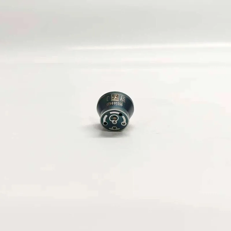 3-BEBJ1D04001-Injector-Valve-1K061010-64-Angled-Profile Elevated side profile of unit injector valve capsule 7206-1010 suitable for BEBJ1D04001 injectors, displaying the flat top face plate assembly anchored onto the flared metal body.
