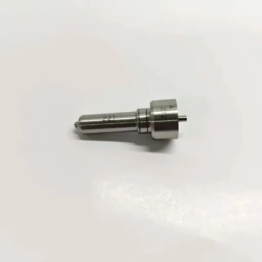 3-L025PBC-Universal-E1-Pump-Nozzle-Horizontal-Profile Horizontal side profile view of the L221PBC unit injector nozzle showing the upper guide pin interface and fuel metering nozzle assembly.