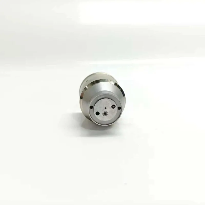 4-20965224-21457950-Injector-Valve-Bottom-End Inverted vertical view of the electronic unit injector control valve focusing on the circular bottom seat design and inner internal guide shaft ring.