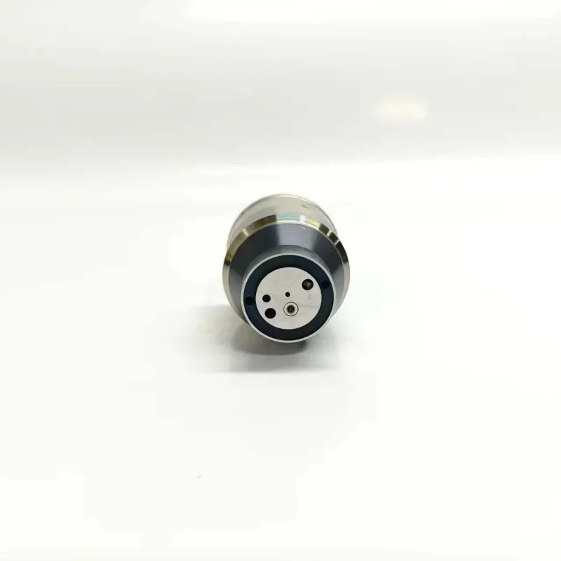 4-33800-84700-Injector-Valve-Bottom-End Inverted vertical view of the electronic unit injector control valve focusing on the circular bottom seat design and inner internal guide shaft ring.
