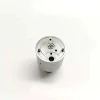 5-E3-0-E3-18-E3-24-Control-Valve-Top-Face Directly overhead view looking down at the precision sealing face of the valve assembly showing fuel flow orifices and parallel indexing pins.