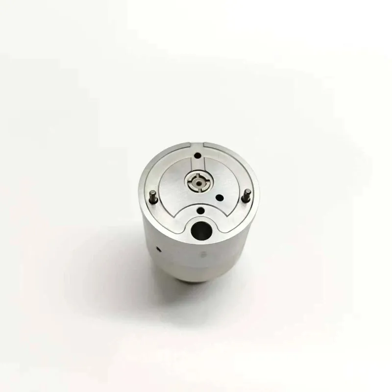 5-E3-0-E3-18-E3-24-Control-Valve-Top-Face Directly overhead view looking down at the precision sealing face of the valve assembly showing fuel flow orifices and parallel indexing pins.