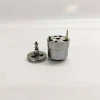 DAF-Yuchai-1668325-Injector-Pump-Valve-1K060440-64-Internal-Components Side view of 1K060440-64 unit pump component suitable for DAF and Yuchai systems, showcasing the main solenoid actuator housing alongside its extracted precision internal valve armature core assembly.
