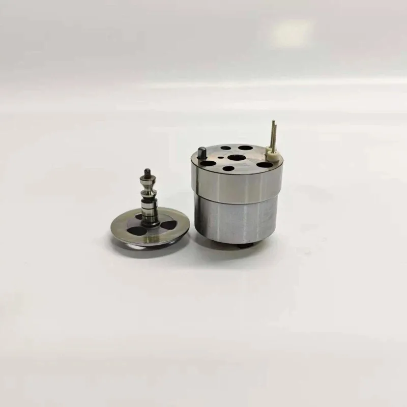 DAF-Yuchai-1668325-Injector-Pump-Valve-1K060440-64-Internal-Components Side view of 1K060440-64 unit pump component suitable for DAF and Yuchai systems, showcasing the main solenoid actuator housing alongside its extracted precision internal valve armature core assembly.