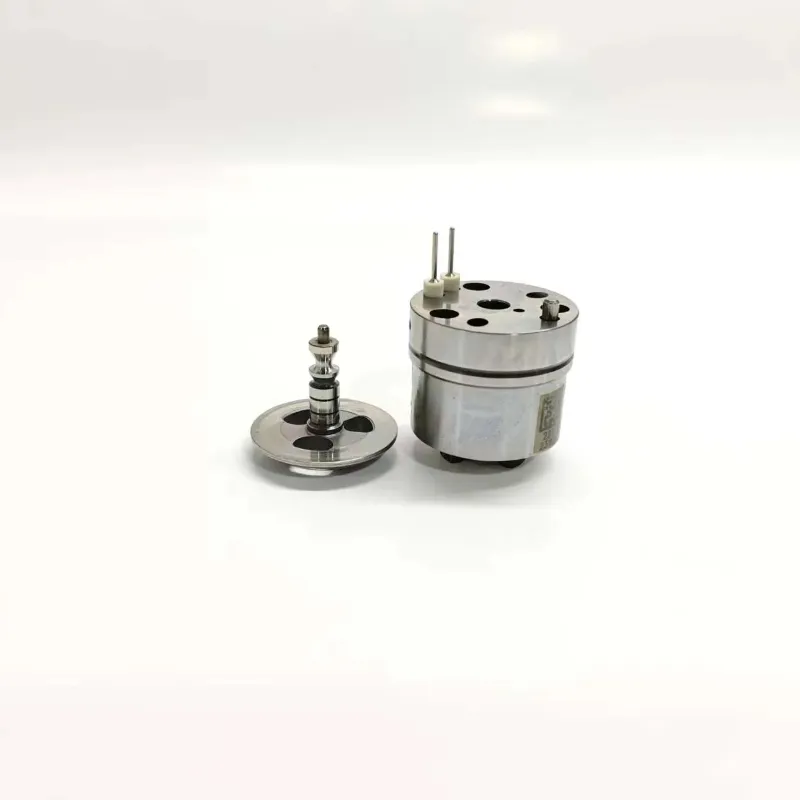 John-Deere-RE533608-Injector-Valve-1K060372-64-Internal-Components Side view of 1K060372-64 unit injector component suitable for John Deere RE533608 systems, showcasing the main solenoid actuator housing alongside its extracted precision internal valve armature core assembly.