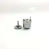 Side view of 1K060379-64 unit injector component suitable for Volvo 20440388 systems, showcasing the main solenoid actuator housing alongside its extracted precision internal valve armature core assembly.