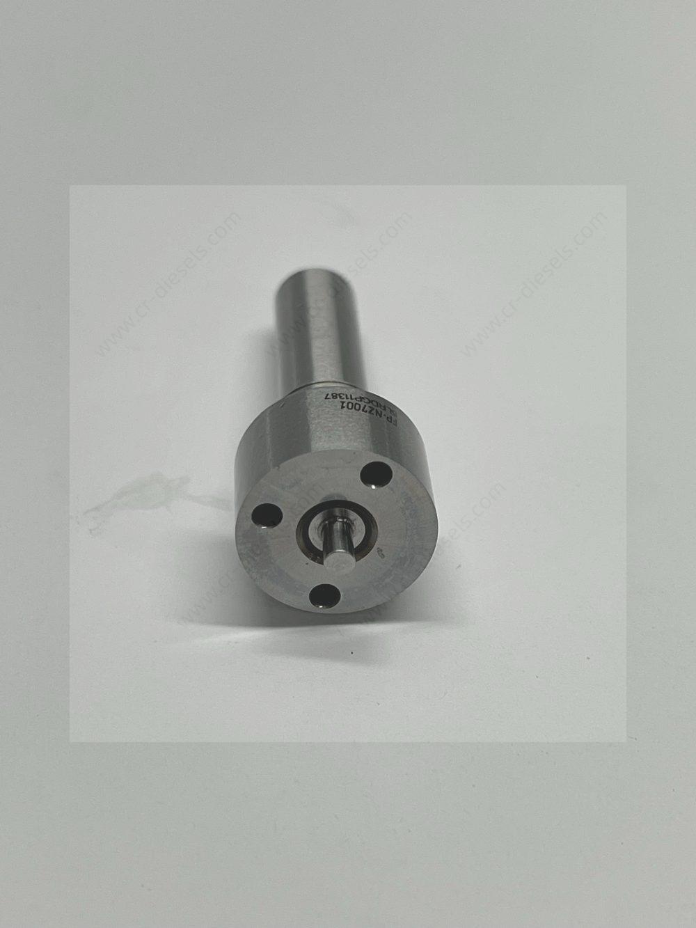 dlw-nozzle-nz7001-l221pbc-bottom-engraving Macro shot of the bottom mating surface of DLW NZ7001 nozzle with FP-NZ7001 part number laser engraved.