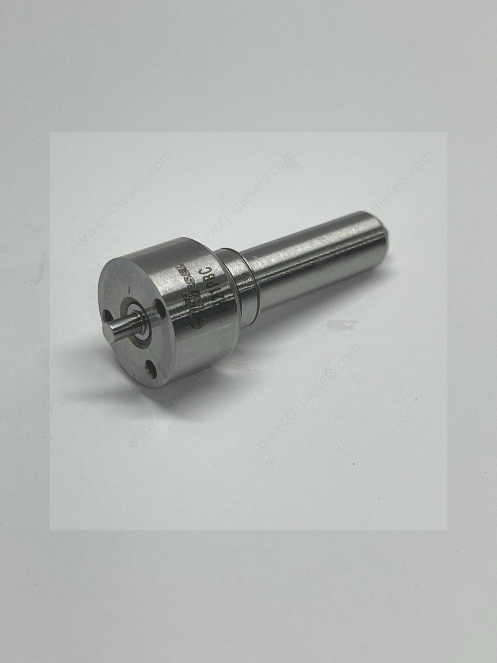 dlw-nozzle-nz7001-l221pbc-inlet-pins Close-up of the rear inlet surface of DLW NZ7001 nozzle, showing the needle valve end and locating pin holes for Delphi E3 unit injectors.