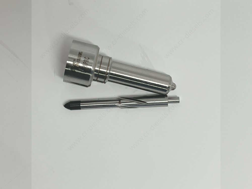 dlw-nozzle-nz7007-l229pbc-needle-and-body Detailed shot of DLW NZ7007 diesel nozzle body disassembled from its inner matching needle valve.