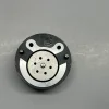 dlw-valve-cv7006-7206-1013-top-view Macro top view of DLW CV7006 valve seating surface, showing high-precision internal fluid orifices and locating pins.