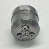 Detailed macro view of DLW CV7010 valve bottom surface, showcasing high-precision internal flow chambers.